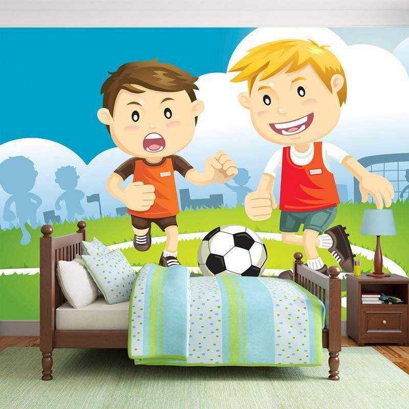 34,00 € Fotobehang - Football Players - Boys playing soccer on a green field for children