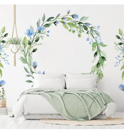 Papier peint - Romantic wreath - plant motif with blue flowers and leaves