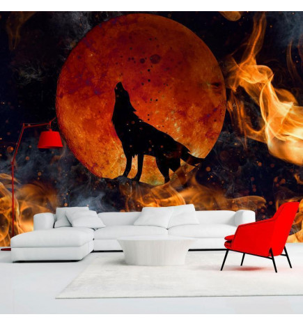 Fotobehang - Wild nature - wolf on a background of a red moon in flames of fire