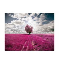 Fotomurale con un albero viola tra i fiori viola - arredalacasa