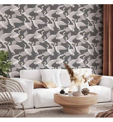 Wallpaper - Flying birds – a delicate pattern of white and grey herons on a grey background