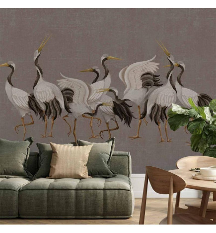 Mural de parede - Crane dance – bright silhouettes of birds against a warm grey background with texture