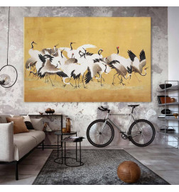 Groot XXL schilderij - Japanese cranes - a flock of birds against a golden background based on a painting by Ishida Yūte