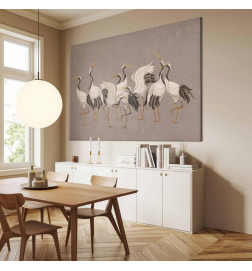 Groot XXL schilderij - Crane dance – bright silhouettes of birds against a warm grey background with texture