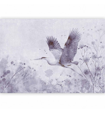 Fotomural - Majestic flight - a crane in flight in monochrome
