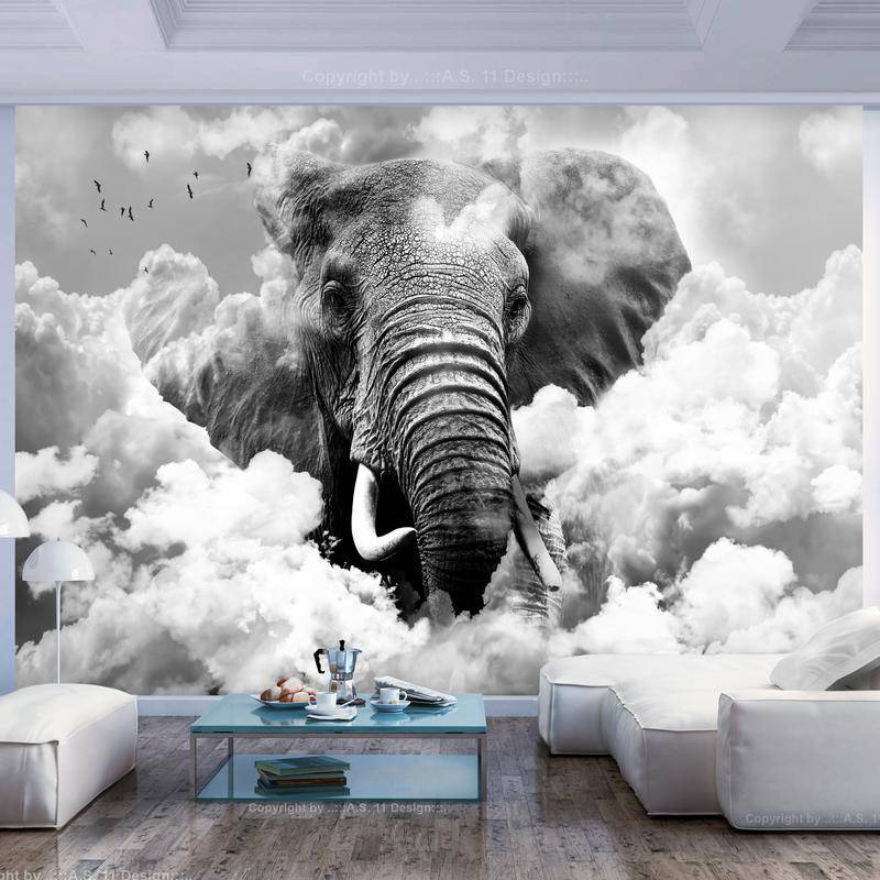 34,00 € www.arredalacasa.com Fotomurale con un elefante tra le nuvole - Arredalacasa