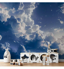 Fotobehang - Starry Clouds and Delicate Light Over a Corner of the Sky