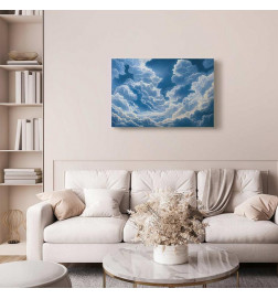 Schilderij - Blue Sky Breaking Through White Fluffy Clouds