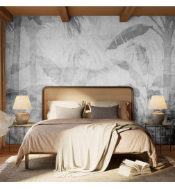 Wall Mural - Vanishing jungle - landscape of exotic trees and leaves in grey tones