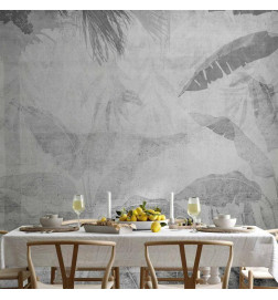 Mural de parede - Vanishing jungle - landscape of exotic trees and leaves in grey tones
