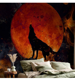 Carta da parati - Wild nature - wolf on a background of a red moon in flames of fire