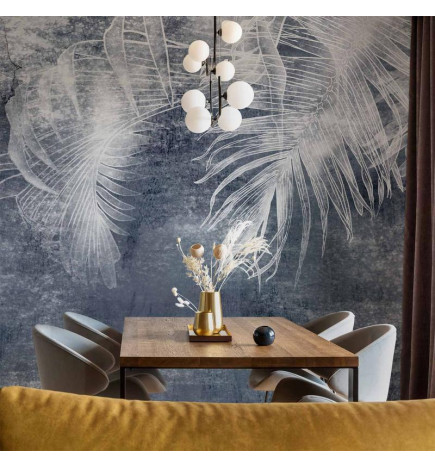 Wall Mural - Abstraction with nature - exotic leaves on a blue background with pattern