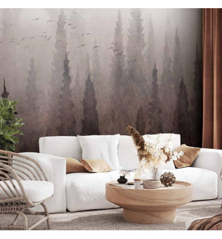 Wall Mural - Birds flight over treetops - landscape of a dark forest in fog