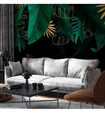 Fotobehang - Jungle and composition - motif of green and golden leaves on a black background