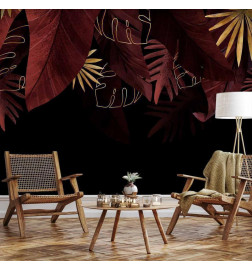 Fototapeta - Jungle and composition - red and gold leaf motif on black background