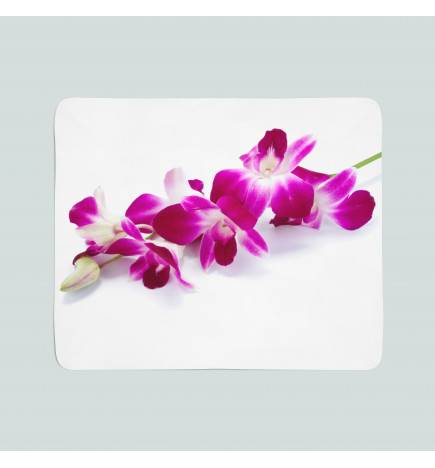 2 fleecepeittoa - purppuranpunaisilla orkideoilla