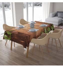 Tischdecken – mit Blättern auf dem Holz