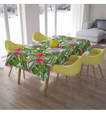 Tischdecken – mit Hibiskusblüten zwischen den Blättern