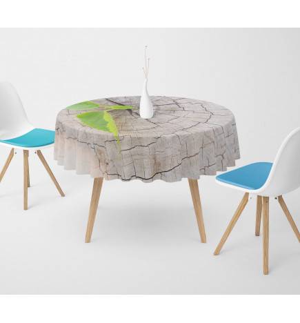 Runde Tischdecken – mit einem Baumspross