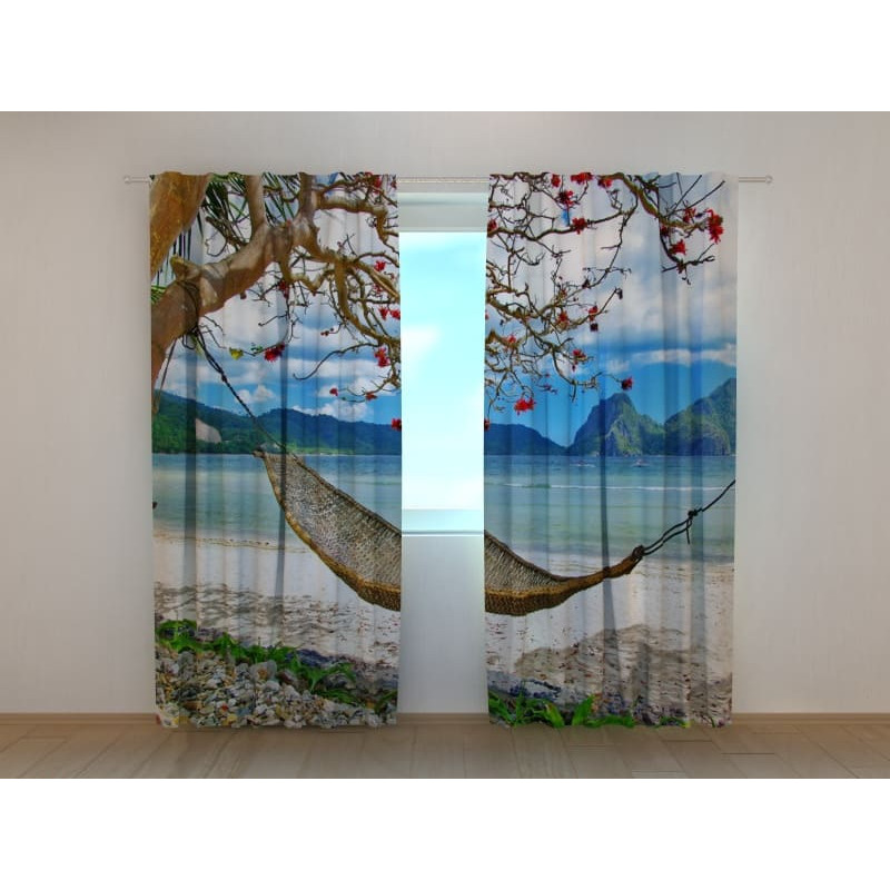 1,00 € Tilausteltta - meren rannalla riippumatolla