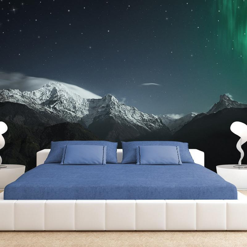 34,00 € Fotobehang - Northern Lights - Snowy Mountain Landscape in Winter Night with Cosmos in the Background