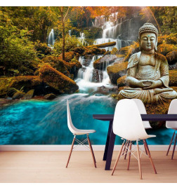 Fototapeet - Orient - landscape with Buddha sculpture on a background of a waterfall and exotic forest