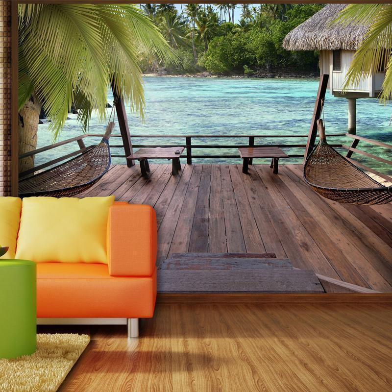 34,00 € Fotomural - Tropical Landscape - Turquoise water with palm trees and wooden cottages