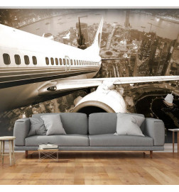 73,00 € Wall Mural - Airplane taking off from the city