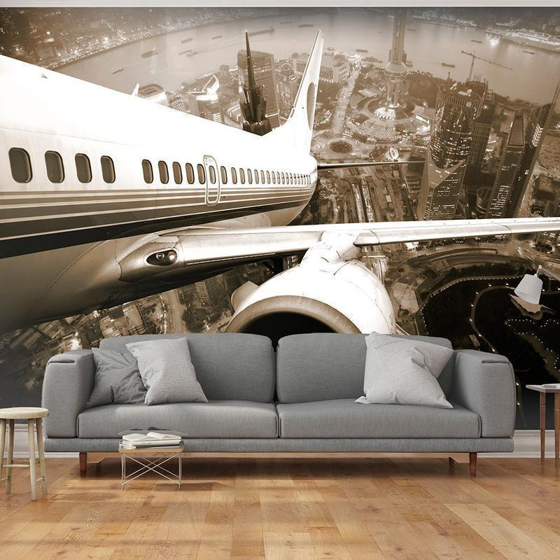 73,00 € Fototapeta - Airplane taking off from the city