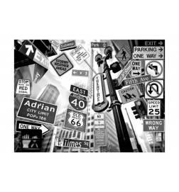Fotomurale con i cartelli stradali in bianco e nero
