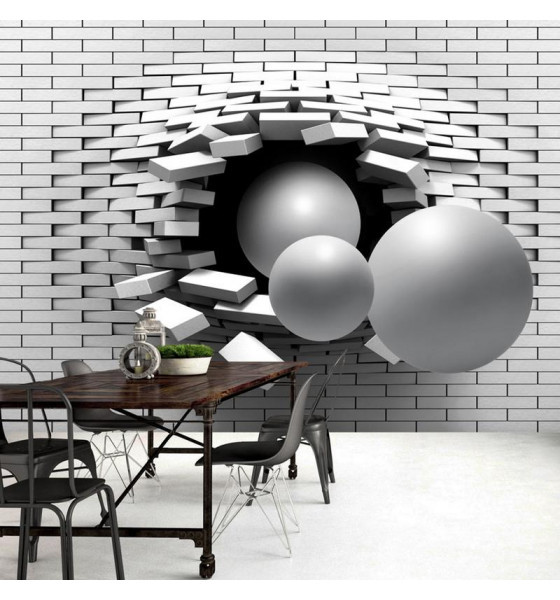 sfere - buco nel muro